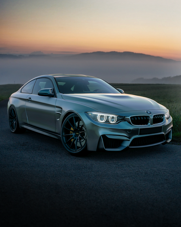 Blue BMW with custom wheels